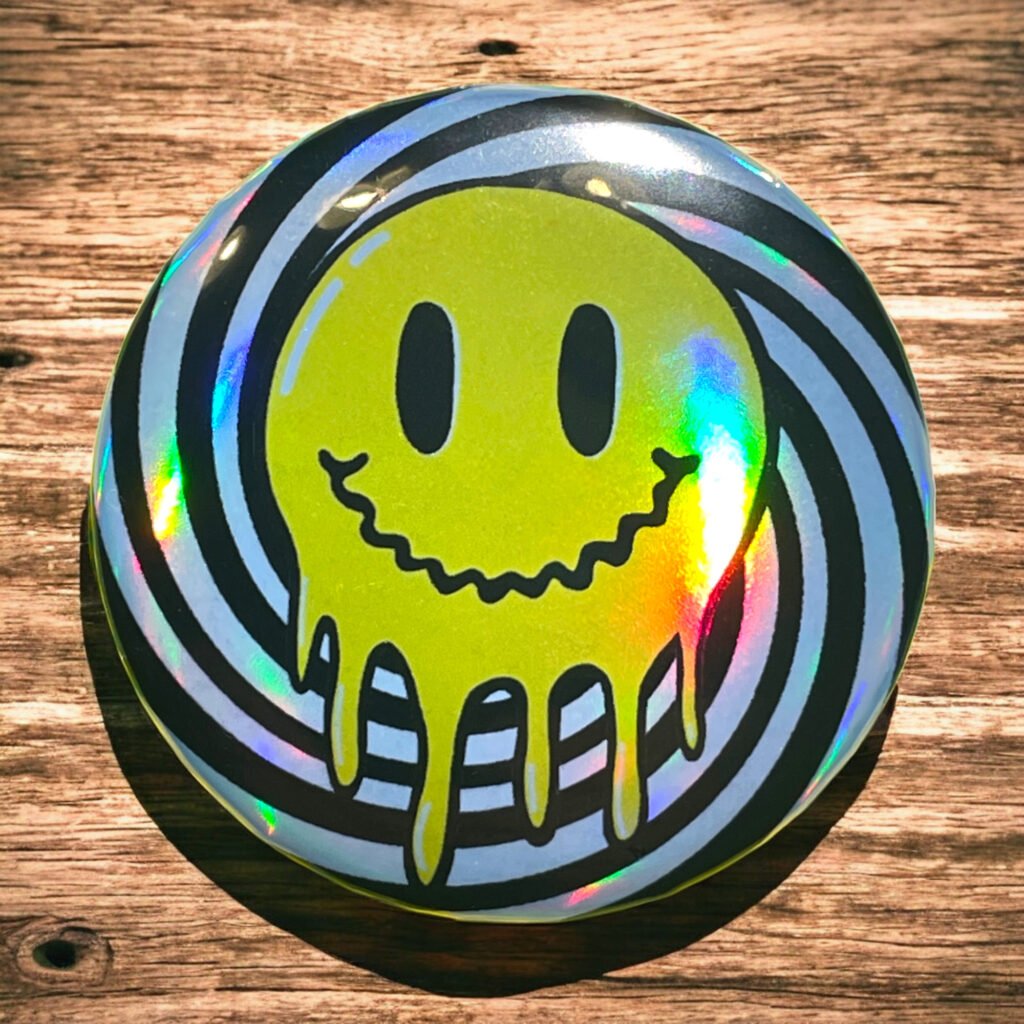Badge holographique Smiley coulant