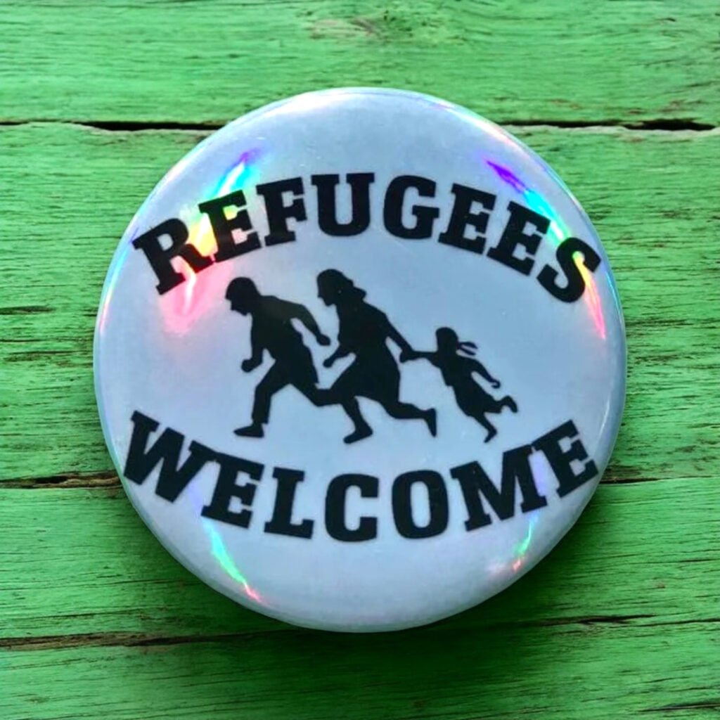 Badge holographique Refugees Welcome