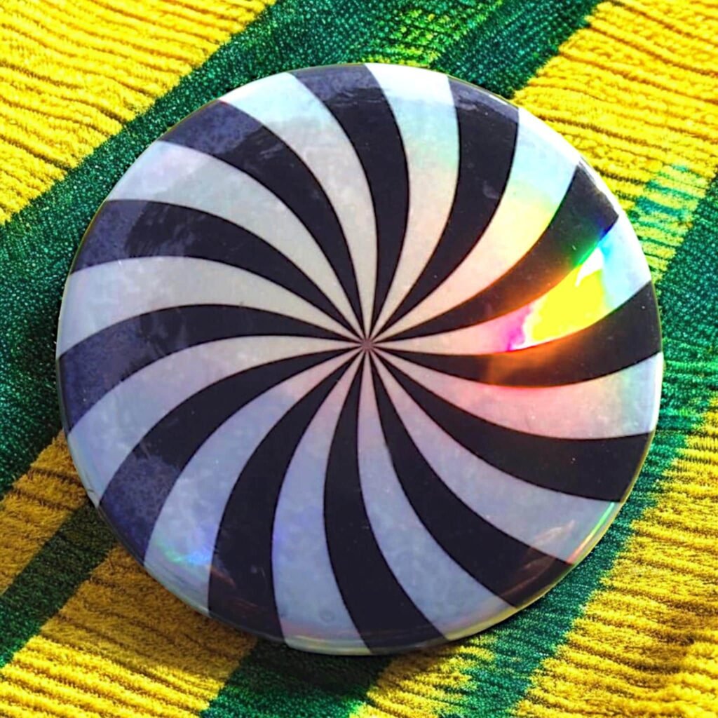Badge holographique moulin spirale