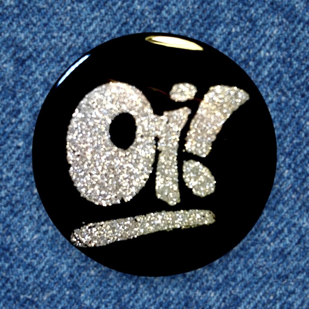 Badge à paillette ou holographique Oi!