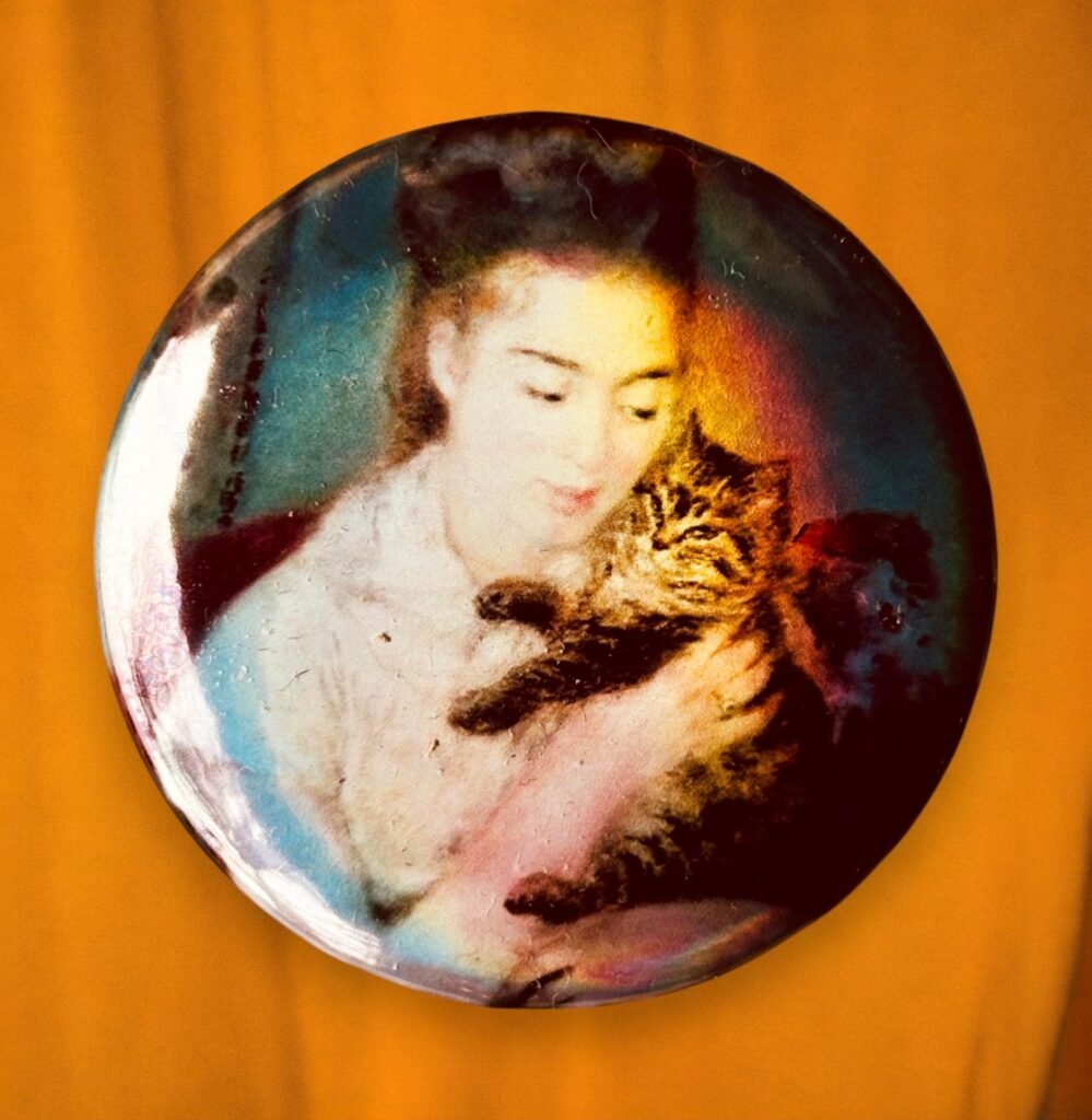 Badge holographique Femme au chat par Renoir