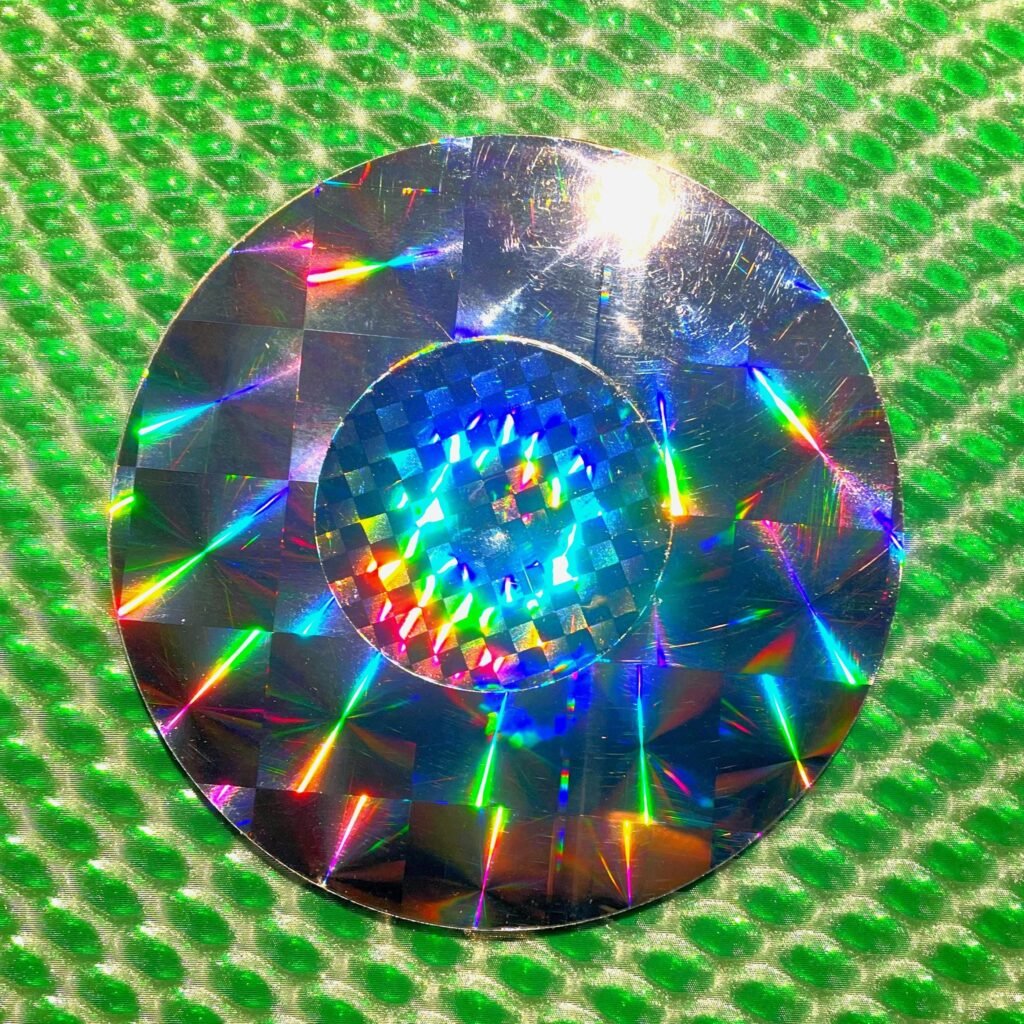 Toupie Laser Dazer vintage – Jouet holographique années 90 | Effets arc-en-ciel & illusion 3D | Ø 9,8 cm (3.85")