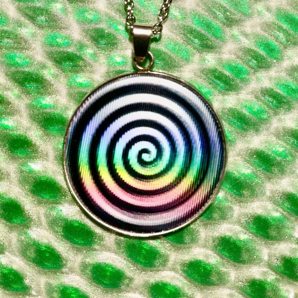Pendentif lenticulaire spirale hypnotique tourbillon animé